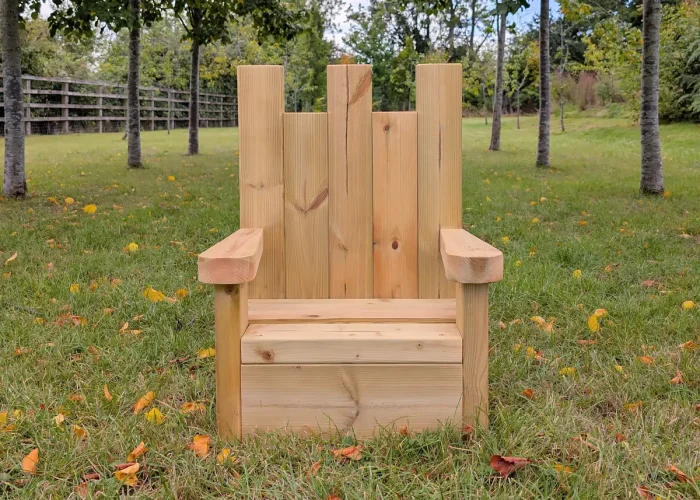 Wooden childrens Mini Throne Seat for social play in a field